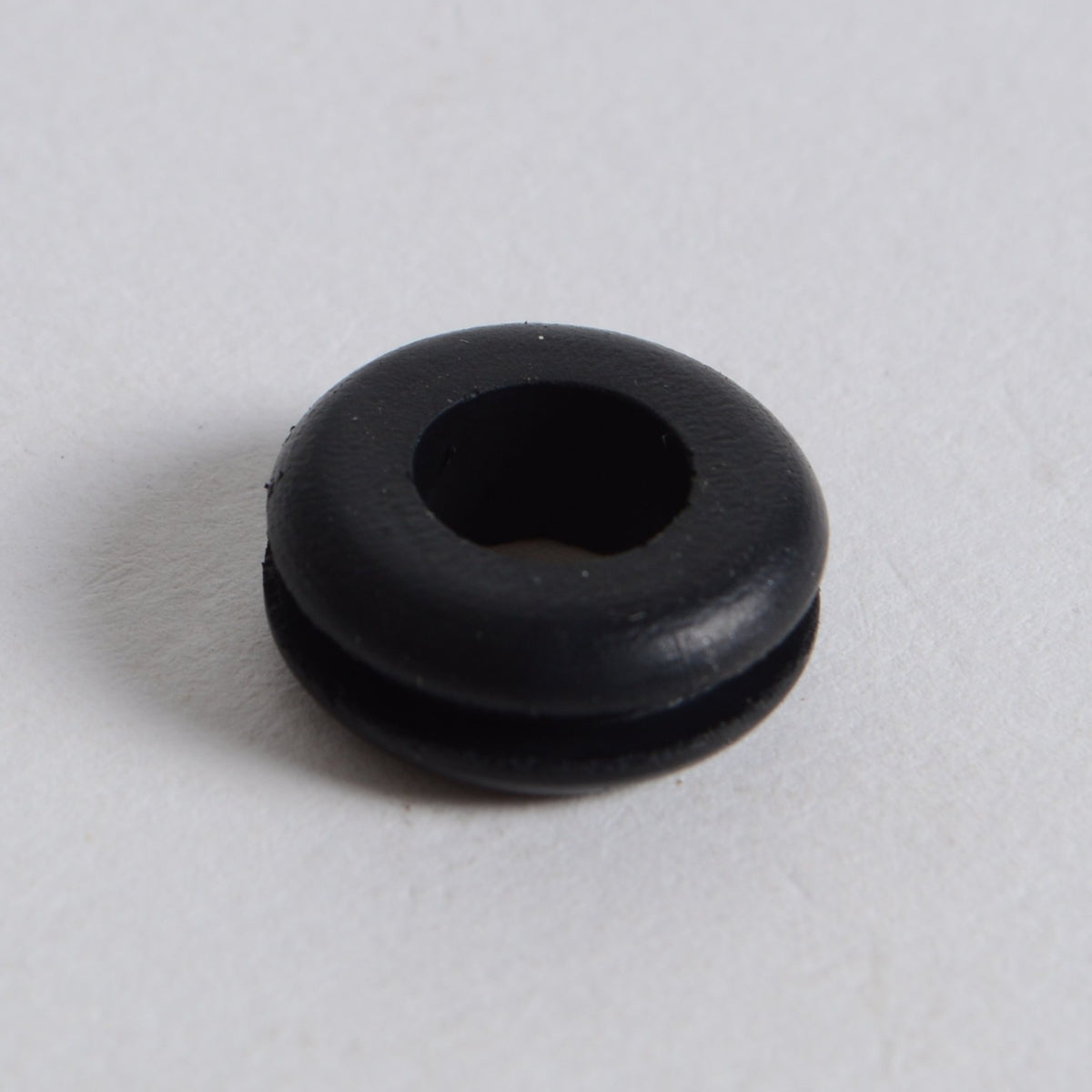 GROMMET - RADIATOR MOUNT - CX 50 AND 65 2021