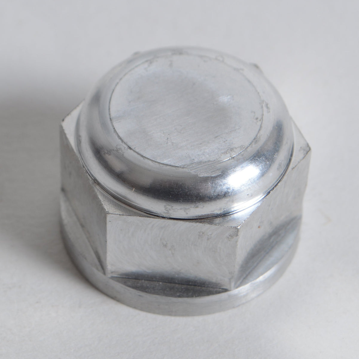 NUT - REAR AXLE - ALUMINUM CX65