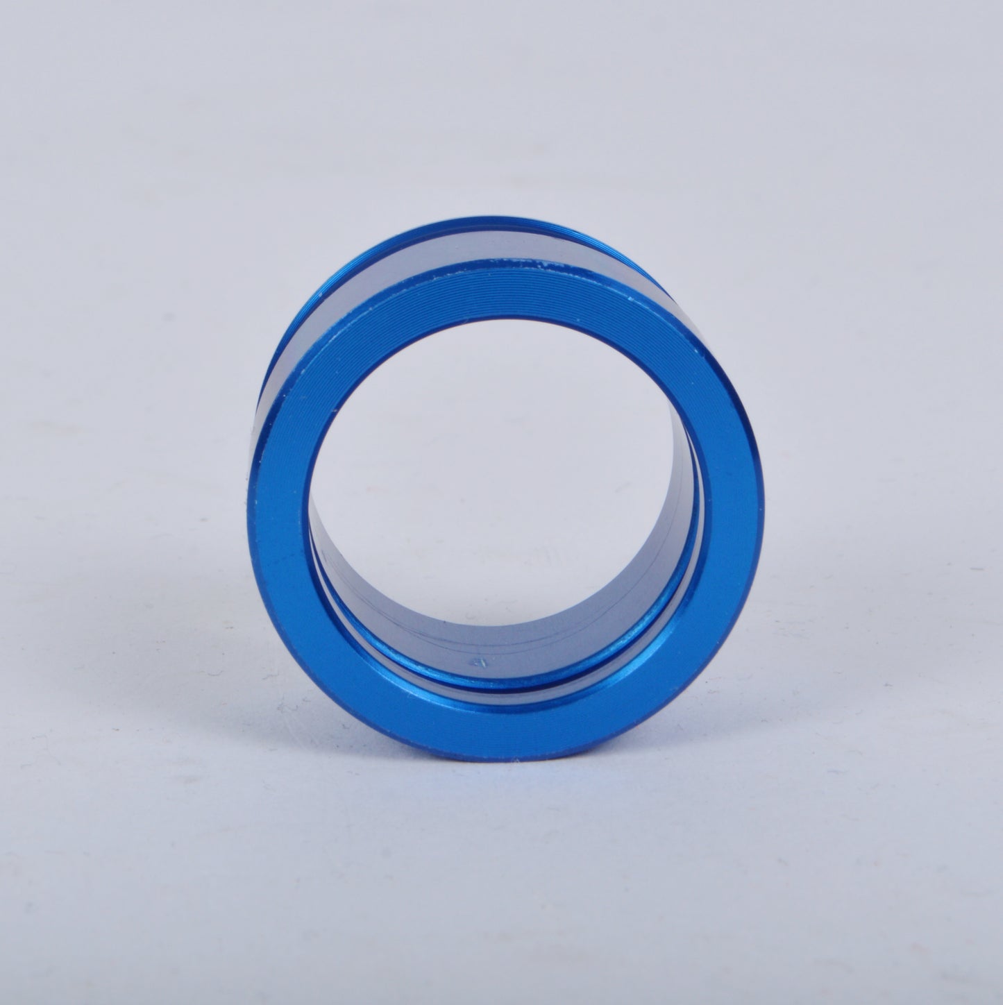 SPACER - FRONT HUB HOLLOW AXLE BLUE
