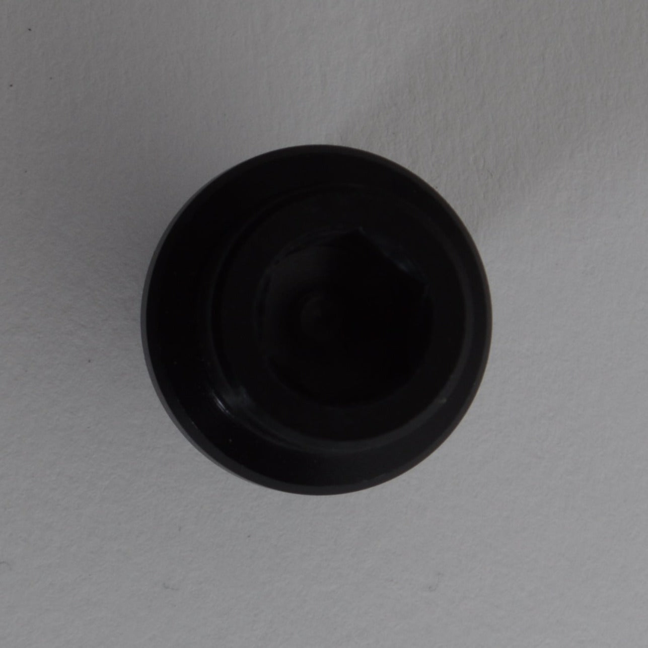 CX50 FRONT AXLE BOLT - M10 X 16 - ALUM - HOLLOW AXLE - BLACK ANODIZE